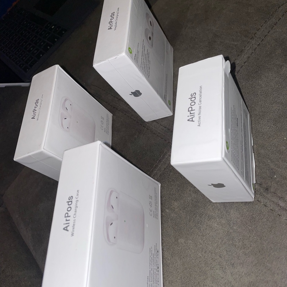 Apple AirPods with Charging Case - White